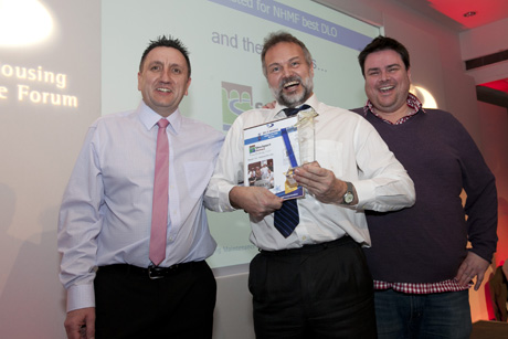 Stockport Homes collect their award for best DLO